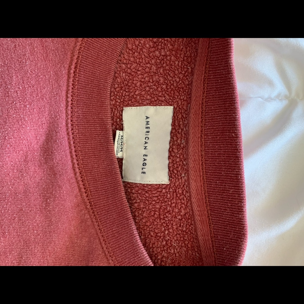 Faded red/pink AEO crewneck